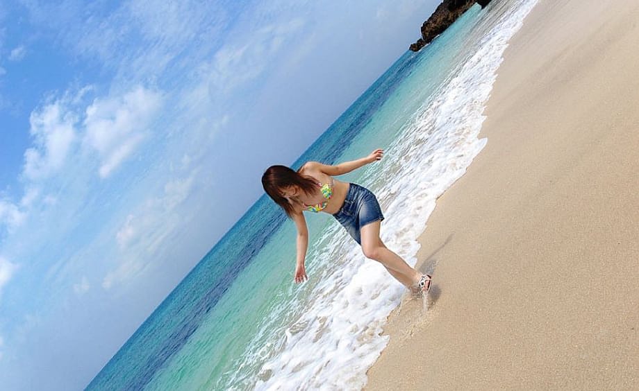 Japanese teen Chikaho Ito models non nude at the beach in a bikini