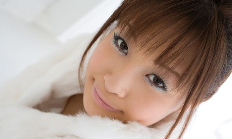 Adorable Japanese girl Misa Kikouden shows long nips while changing clothes