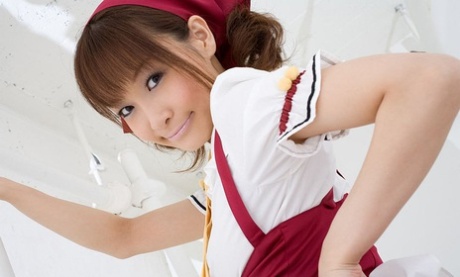 Adorable Japanese girl Misa Kikouden shows long nips while changing clothes