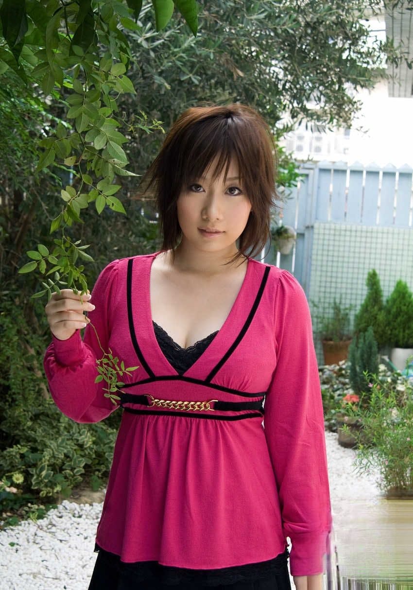 Japanese girl Hanno Nono fondles big naturals while getting mostly naked