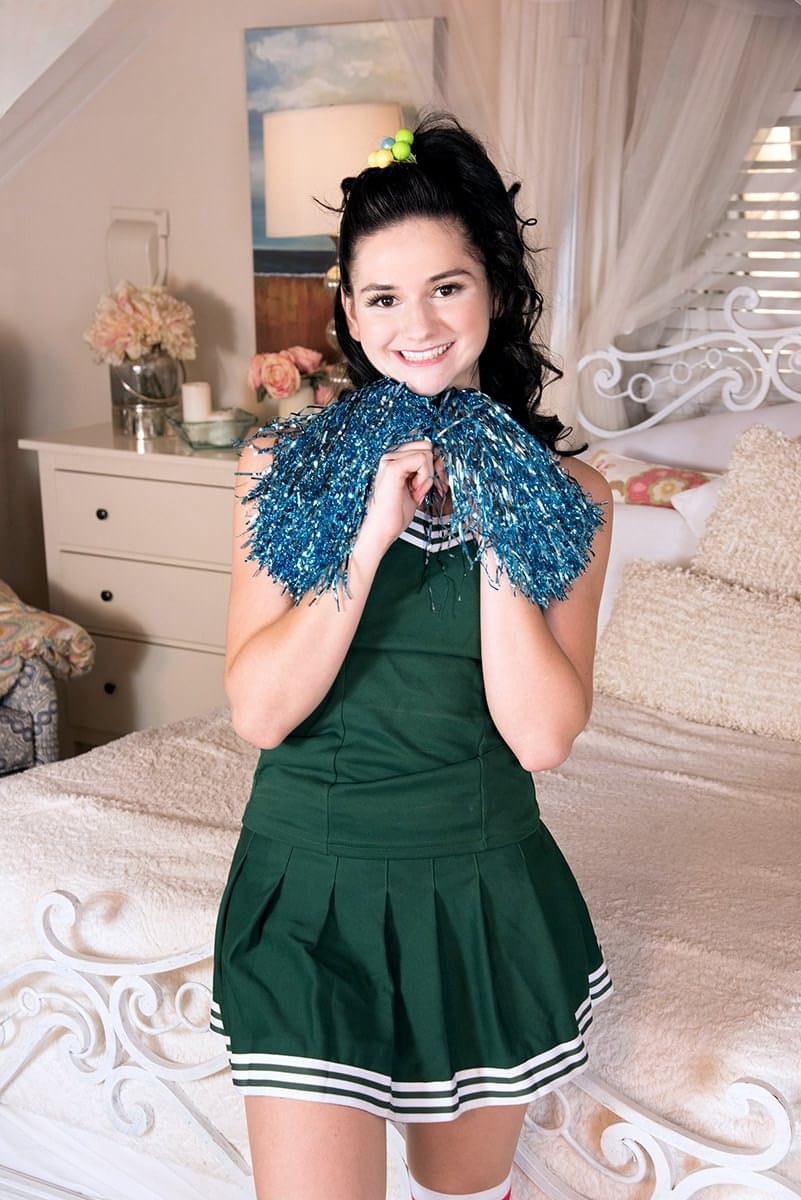 Cute teen Violet Rain is relieved of her cheerleader outfit by her boyfriend