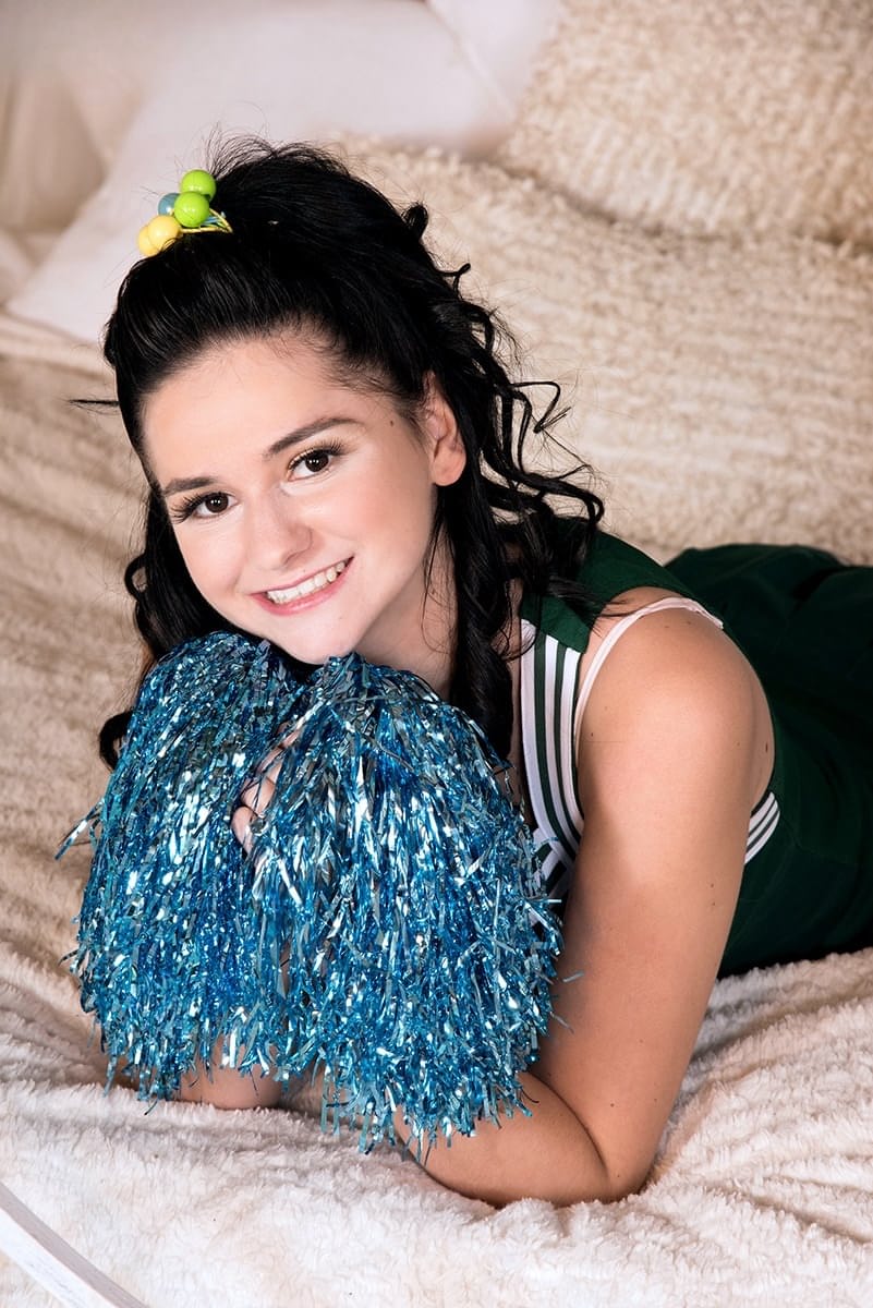 Cute teen Violet Rain is relieved of her cheerleader outfit by her boyfriend