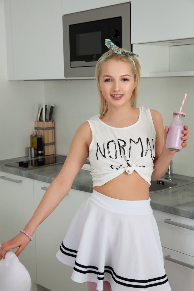 Young looking girl Capri showcases her tight slit after getting naked