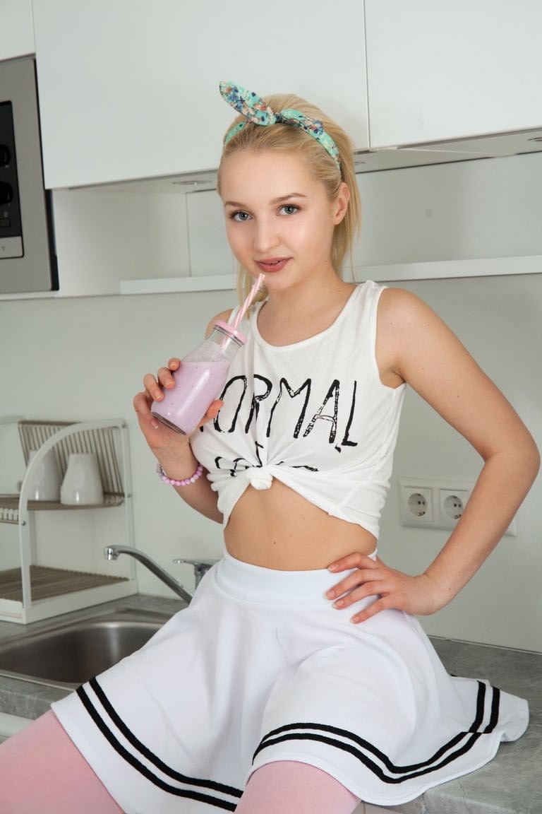 Young looking girl Capri showcases her tight slit after getting naked