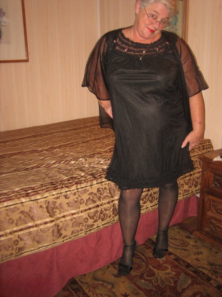Obese amateur Girdle Goddess removes cupless bra as she strips to stockings
