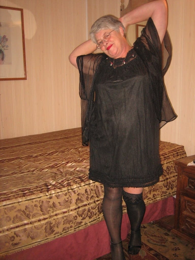 Obese amateur Girdle Goddess removes cupless bra as she strips to stockings
