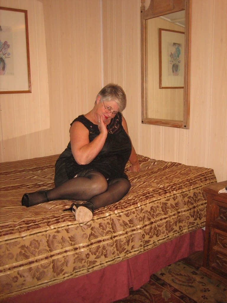Obese amateur Girdle Goddess removes cupless bra as she strips to stockings