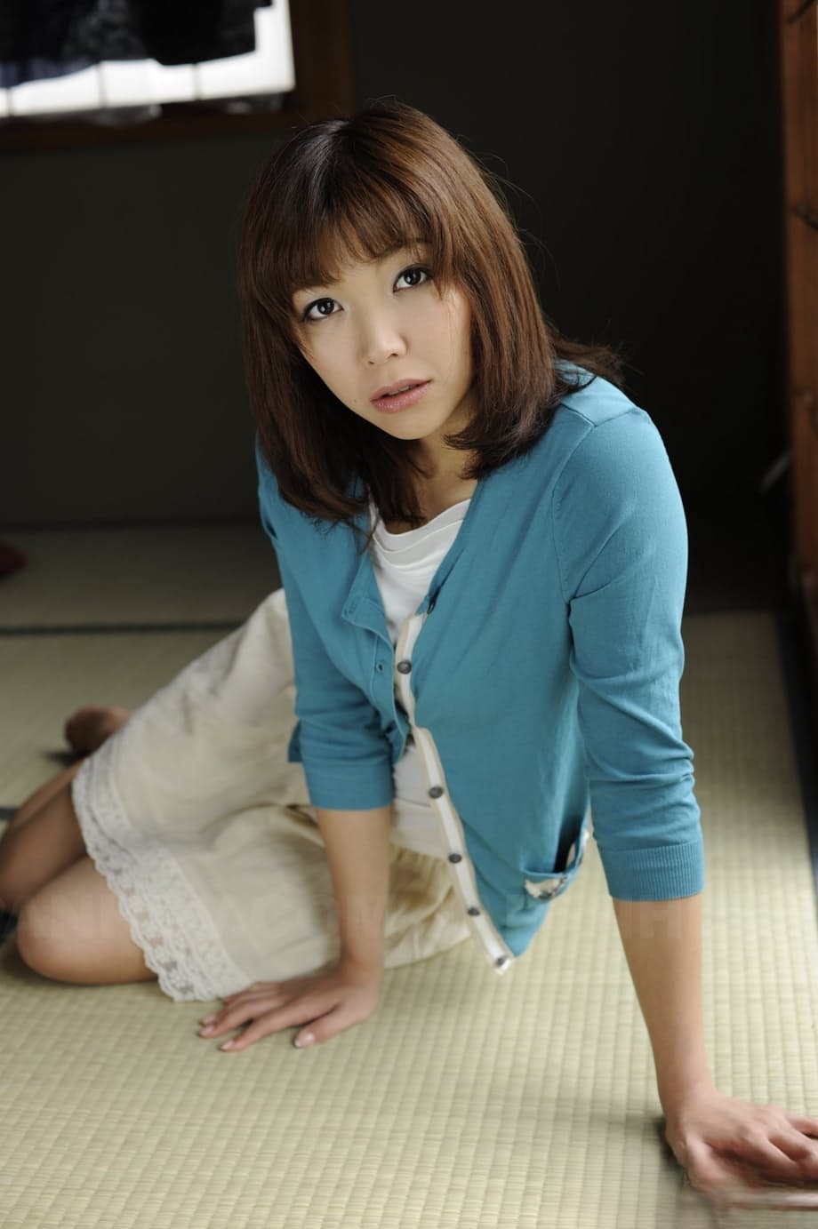 Japanese solo girl Juri Kitahara tentatively shows her trimmed pussy