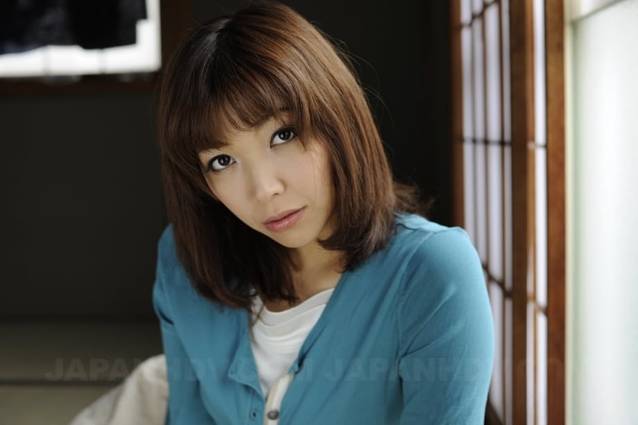 Japanese solo girl Juri Kitahara tentatively shows her trimmed pussy