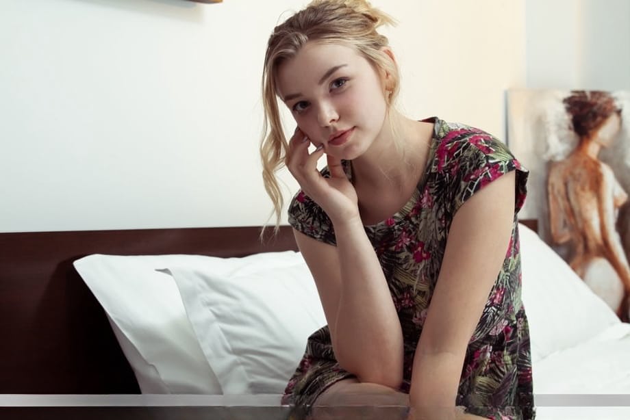 Gorgeous blonde teen Daniel Sea does an ass grab after baring her big boobs