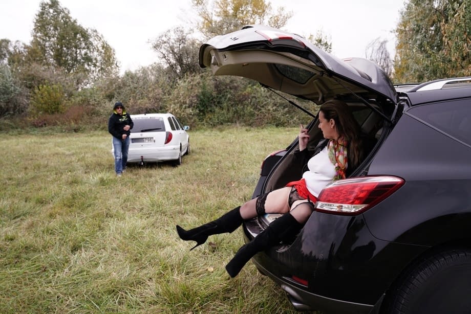 Horny granny Eva Jayne gets cum on her face after a gangbang in a field