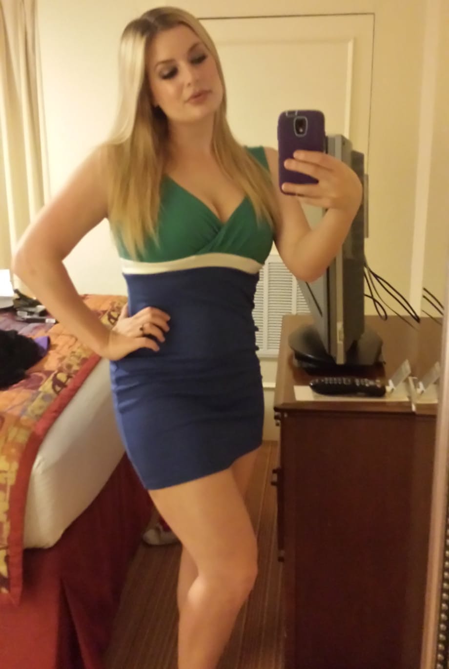 Blonde amateur with natural tits pulls out her phone for naked selfies