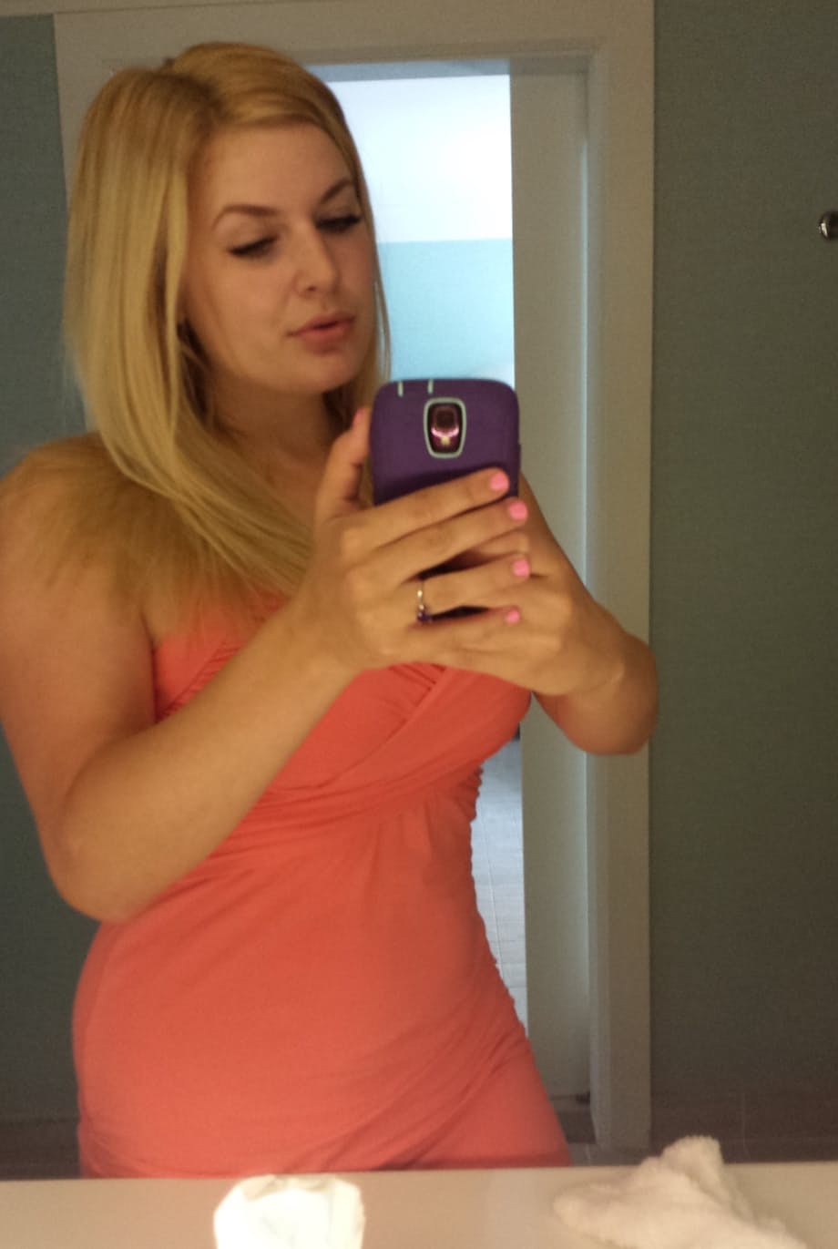 Blonde amateur with natural tits pulls out her phone for naked selfies