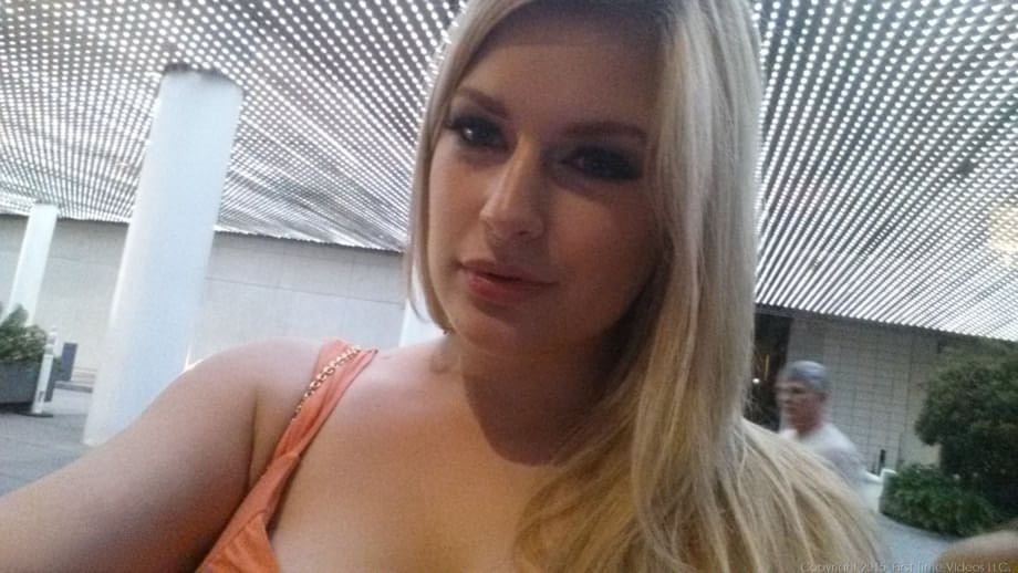 Blonde amateur with natural tits pulls out her phone for naked selfies