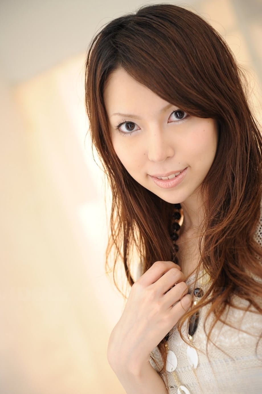 Japanese solo girl Rino Tokiwa models non nude in skirt and ankle strap shoes