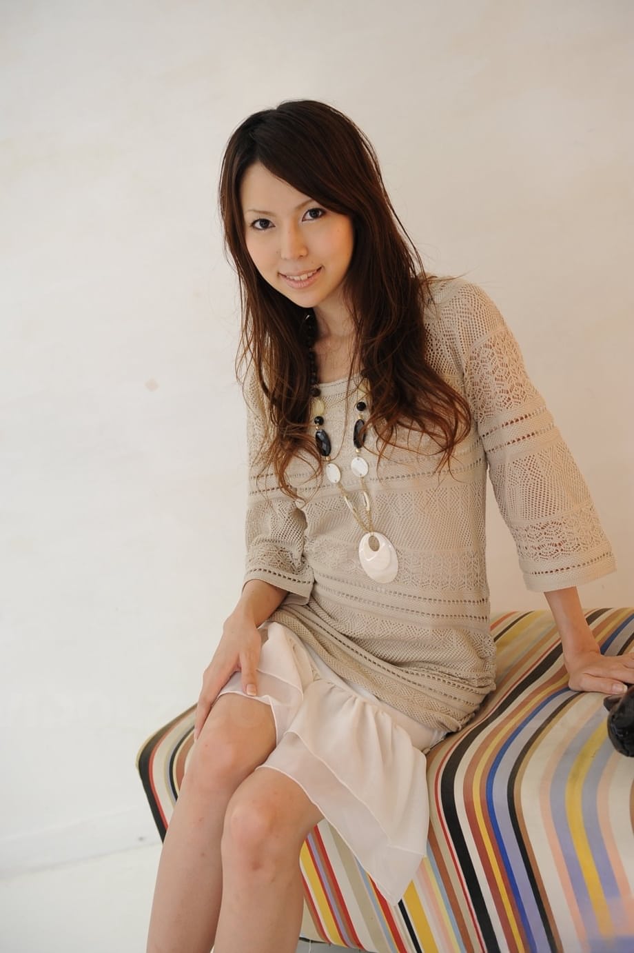 Japanese solo girl Rino Tokiwa models non nude in skirt and ankle strap shoes