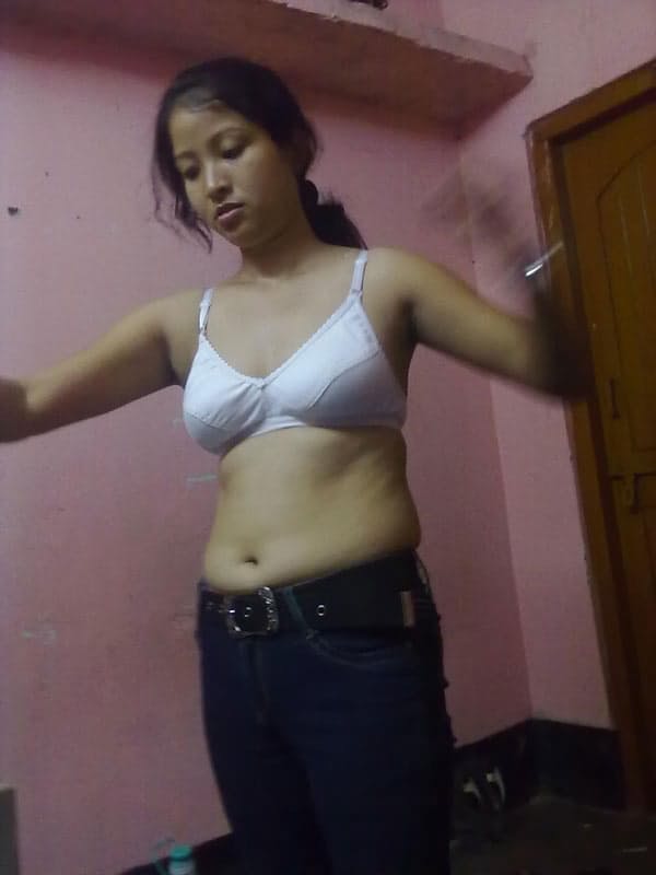 Nepalese girl uncovers natural tits as she disrobes to her panties