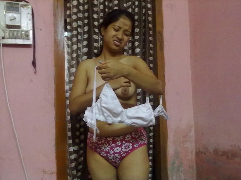 Nepalese girl uncovers natural tits as she disrobes to her panties