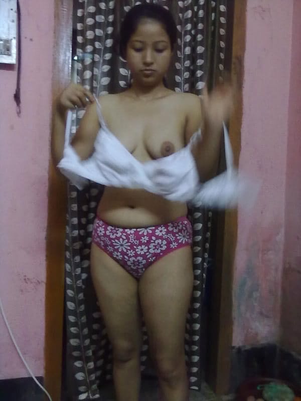 Nepalese girl uncovers natural tits as she disrobes to her panties