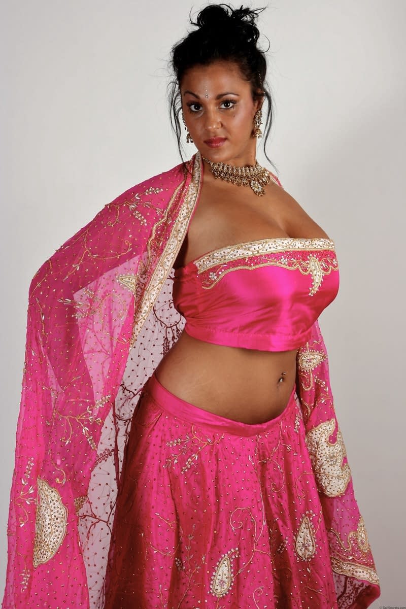 Indian female Keira unveils her big natural tits in bikini bottoms