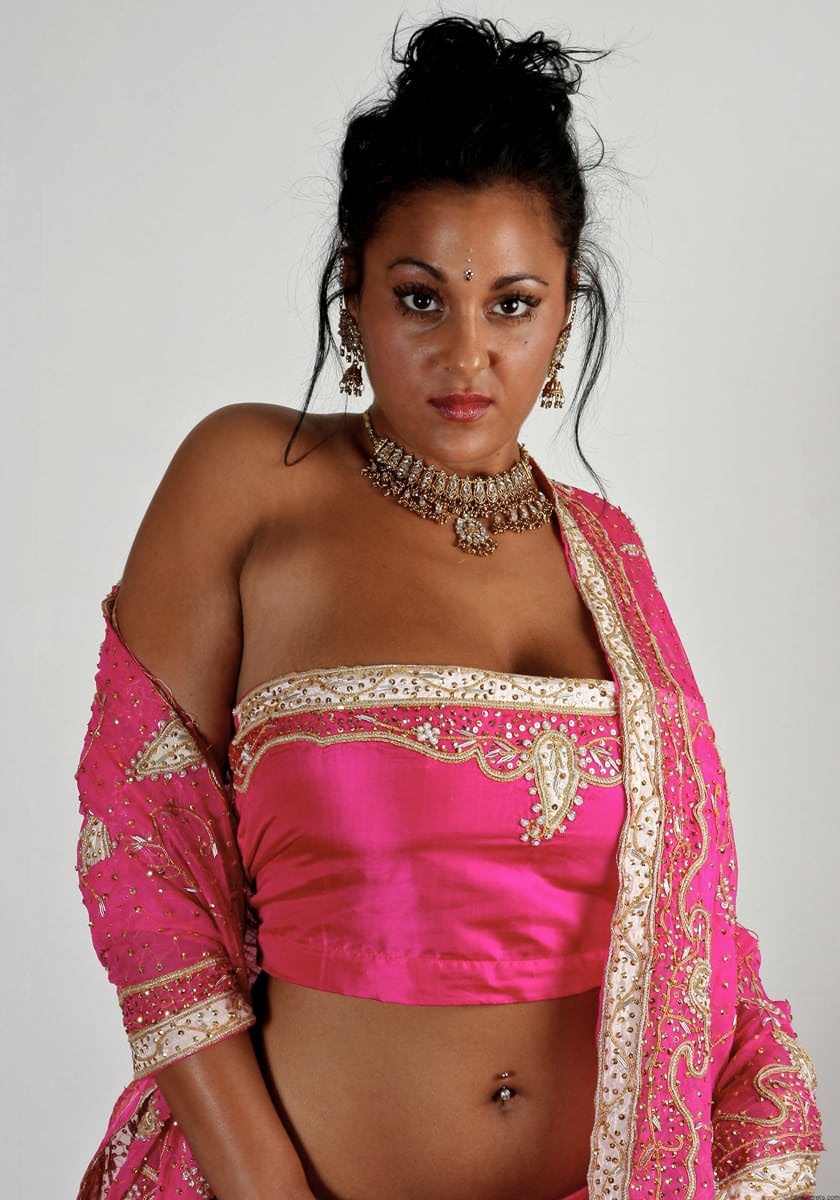 Indian female Keira unveils her big natural tits in bikini bottoms
