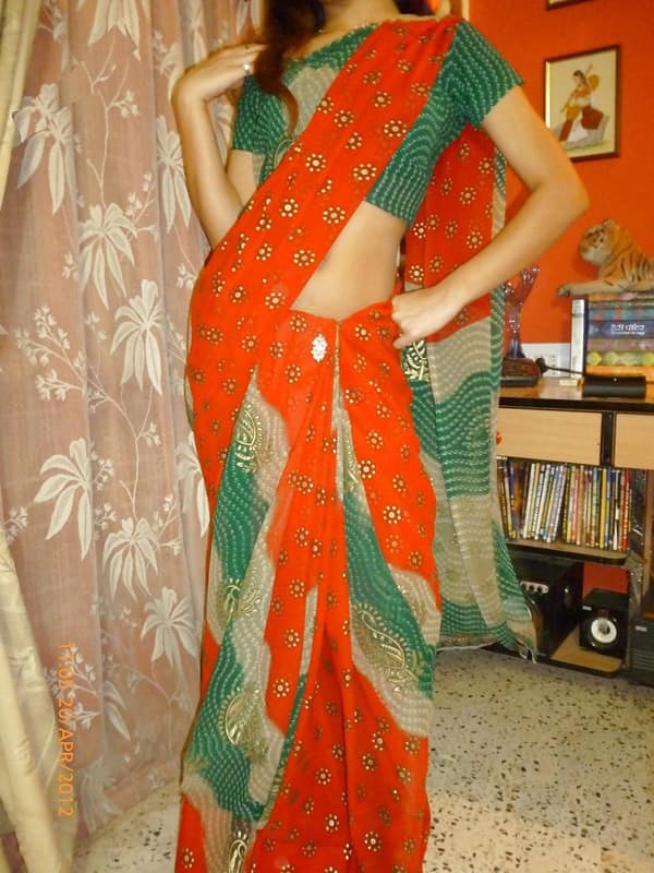 Indian solo girl slides upskirt panties aside before showing her bare breasts