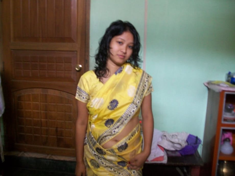Indian wife changes attire while pleasuring her husband on bed POV style