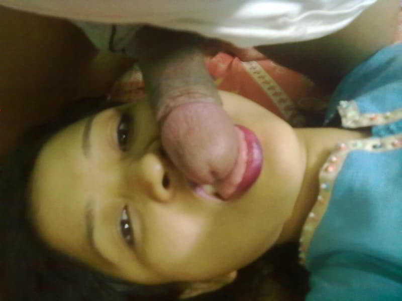 Indian wife changes attire while pleasuring her husband on bed POV style
