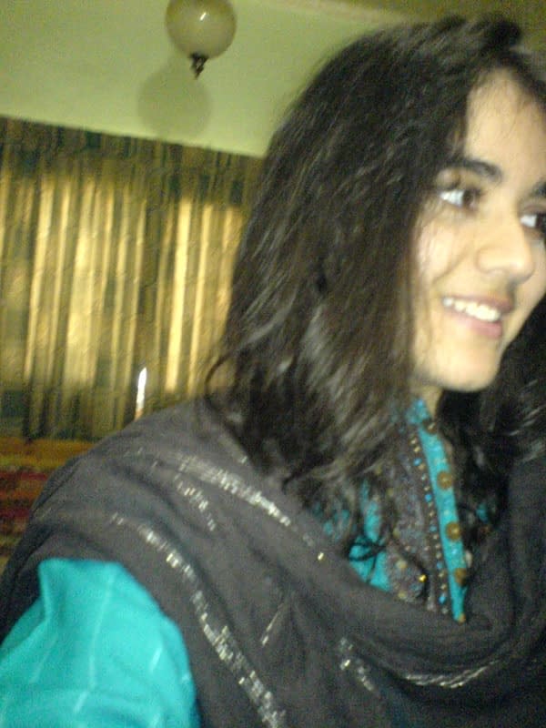 Indian girl takes self shots with big natural tits free of blouse