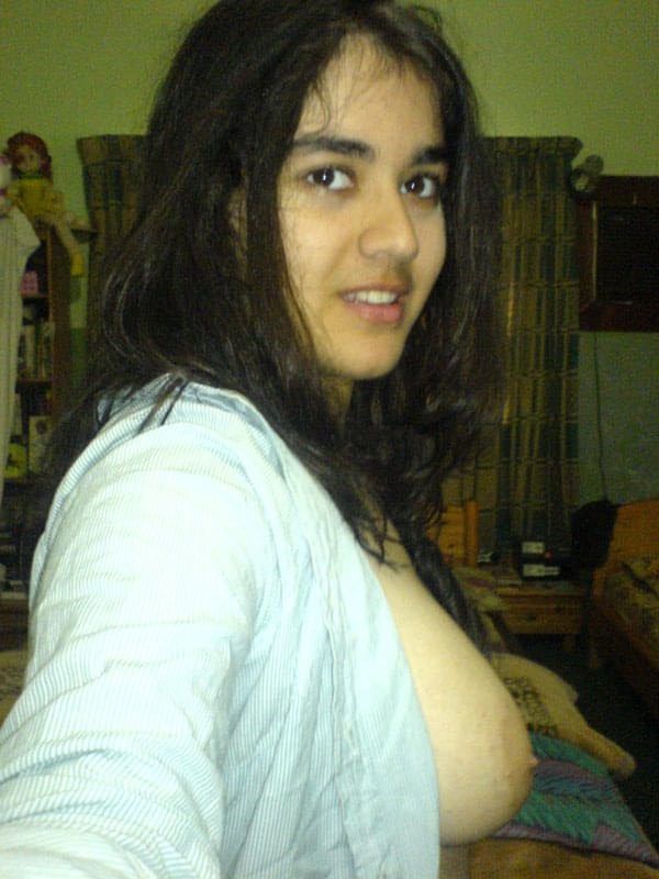 Indian girl takes self shots with big natural tits free of blouse