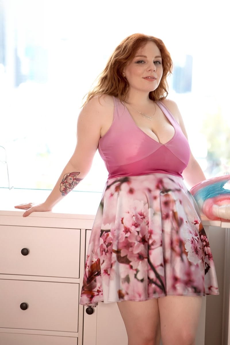 Redheaded Australian BBW Avalon strips naked in her bedroom