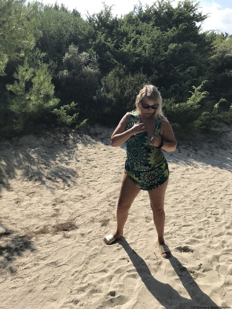 Fat amateur Sweet Susi cups her big boobs after baring her butt on sandy dune