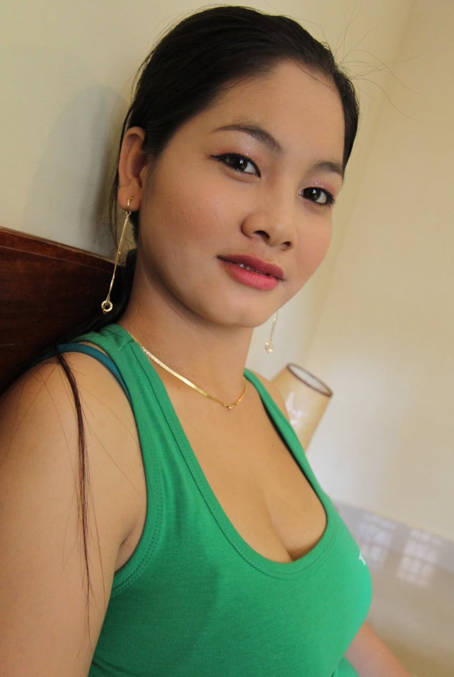 Busty Cambodian girl gets totally naked before POV fucking with a sex tourist