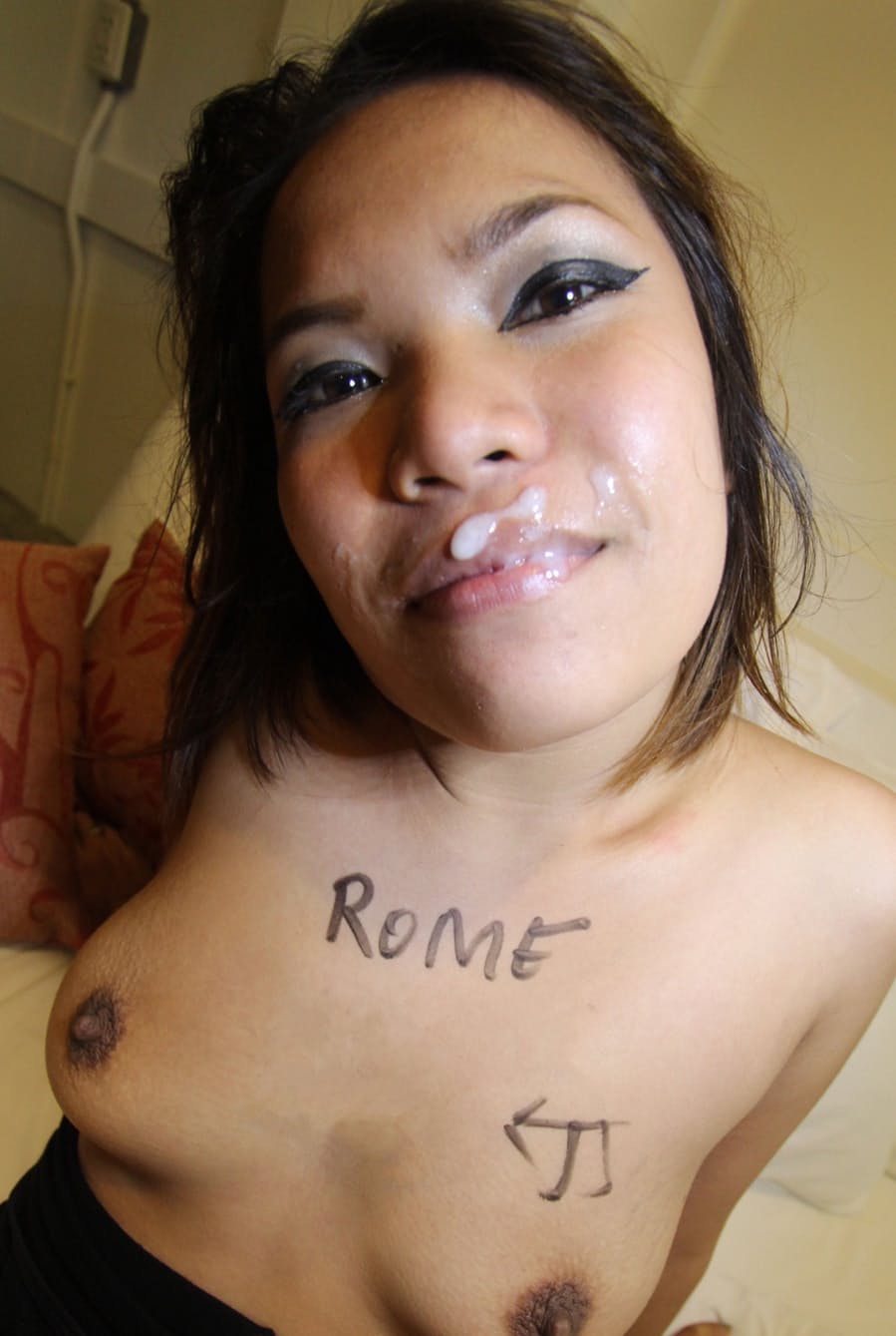 Asian first timer Bee wears cum on her face after sex with a Farang