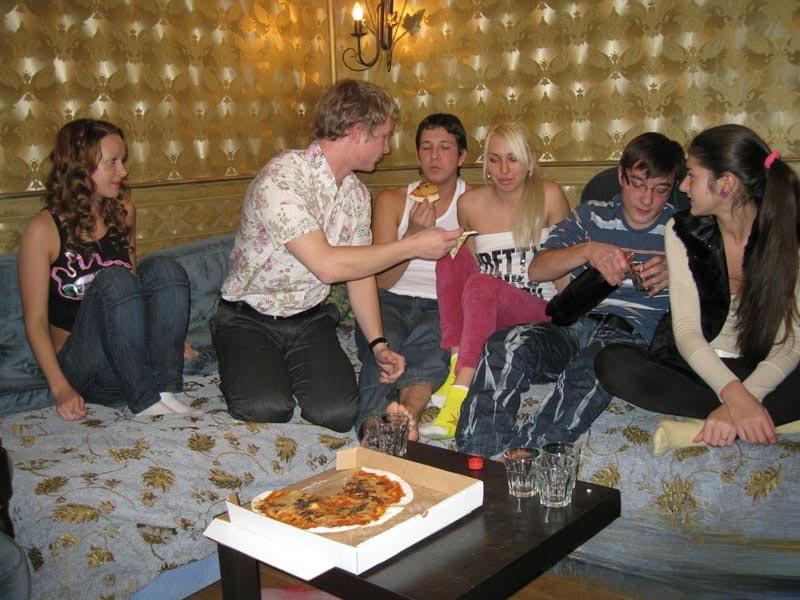Young girls engage in group sex while attending a pizza party