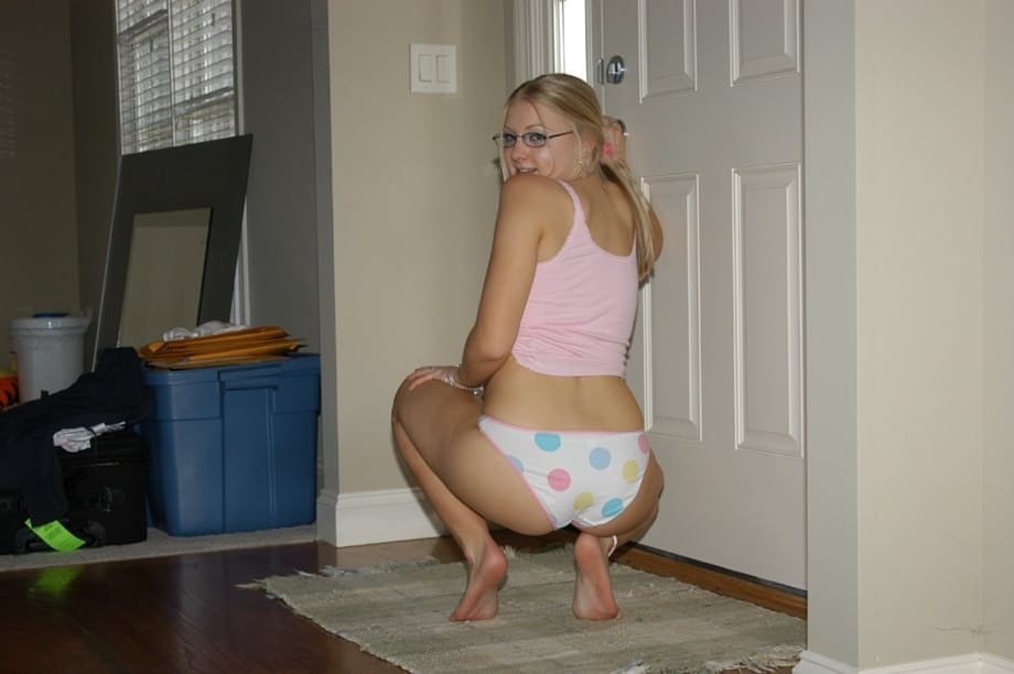 Young blonde girl Tiffany models non nude in cute underwear and glasses