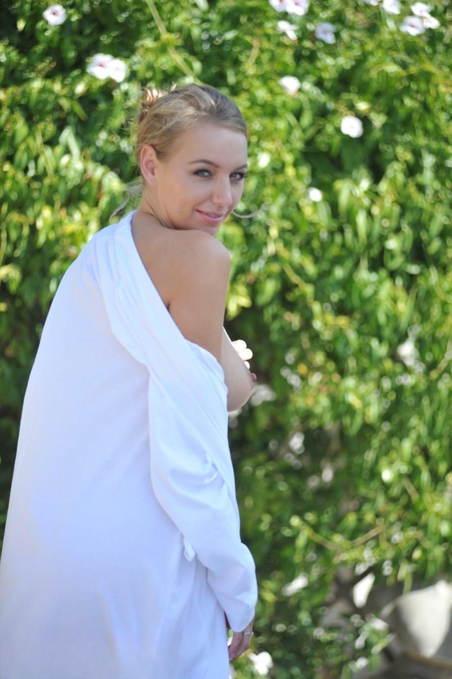 Beautiful girl Hayley Marie Coppin gets rubbed down on the patio by a lesbian