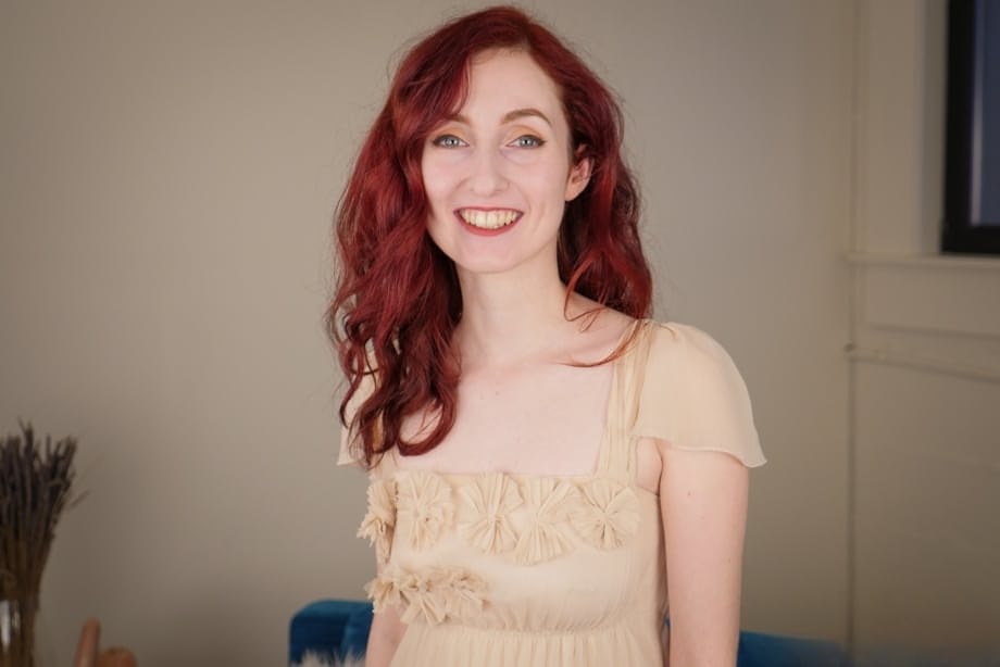 Pale redhead Penny Lay fingers her shaved pussy as she gets totally naked