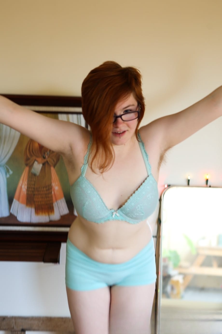 Pale redhead Panda shows her unshaven chubby body with her glasses on