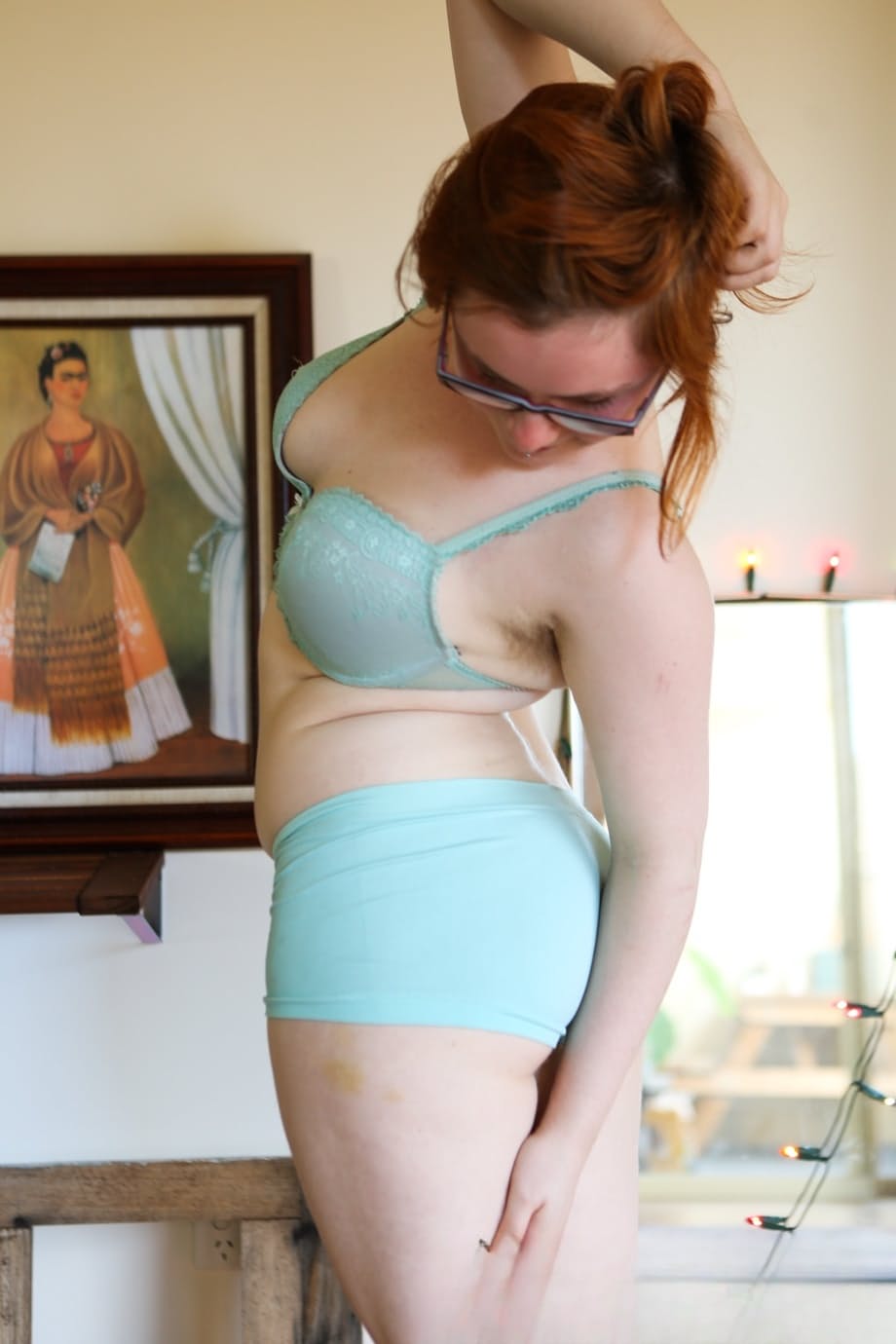 Pale redhead Panda shows her unshaven chubby body with her glasses on