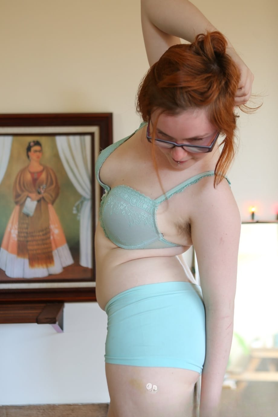 Pale redhead Panda shows her unshaven chubby body with her glasses on