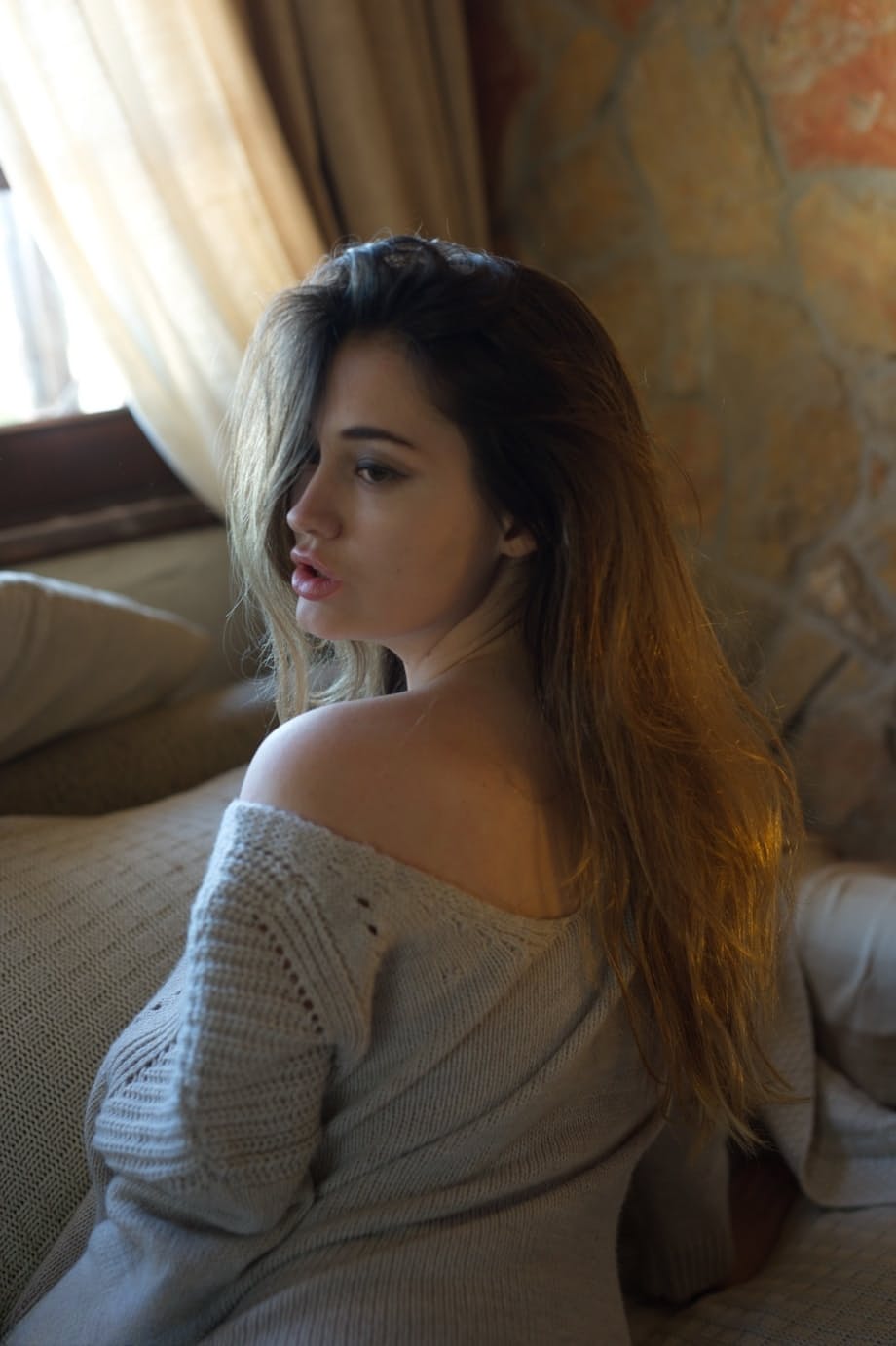 Glamour girl Gabriella Knight frees big naturals from sweater in OTK socks