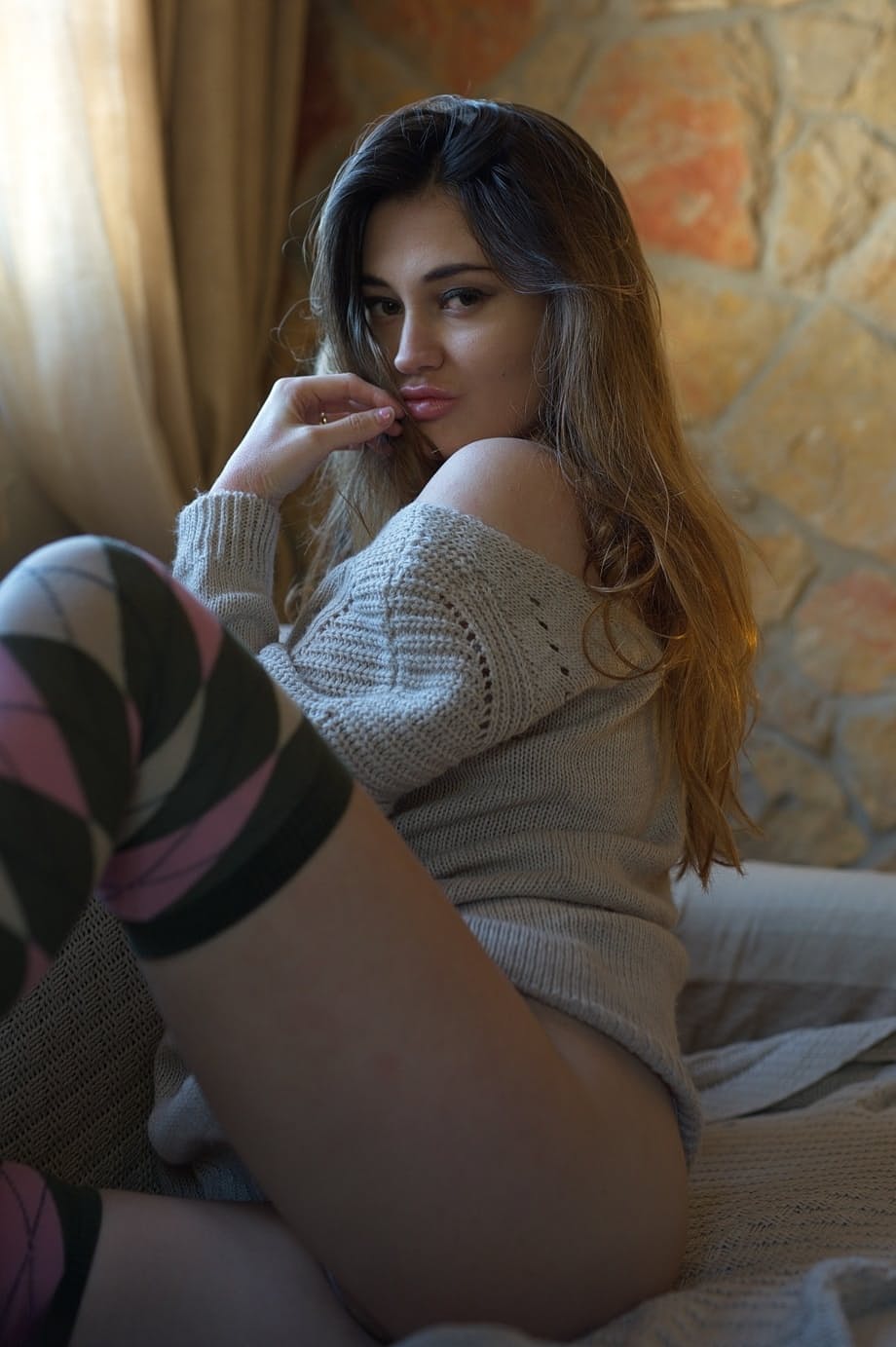 Glamour girl Gabriella Knight frees big naturals from sweater in OTK socks
