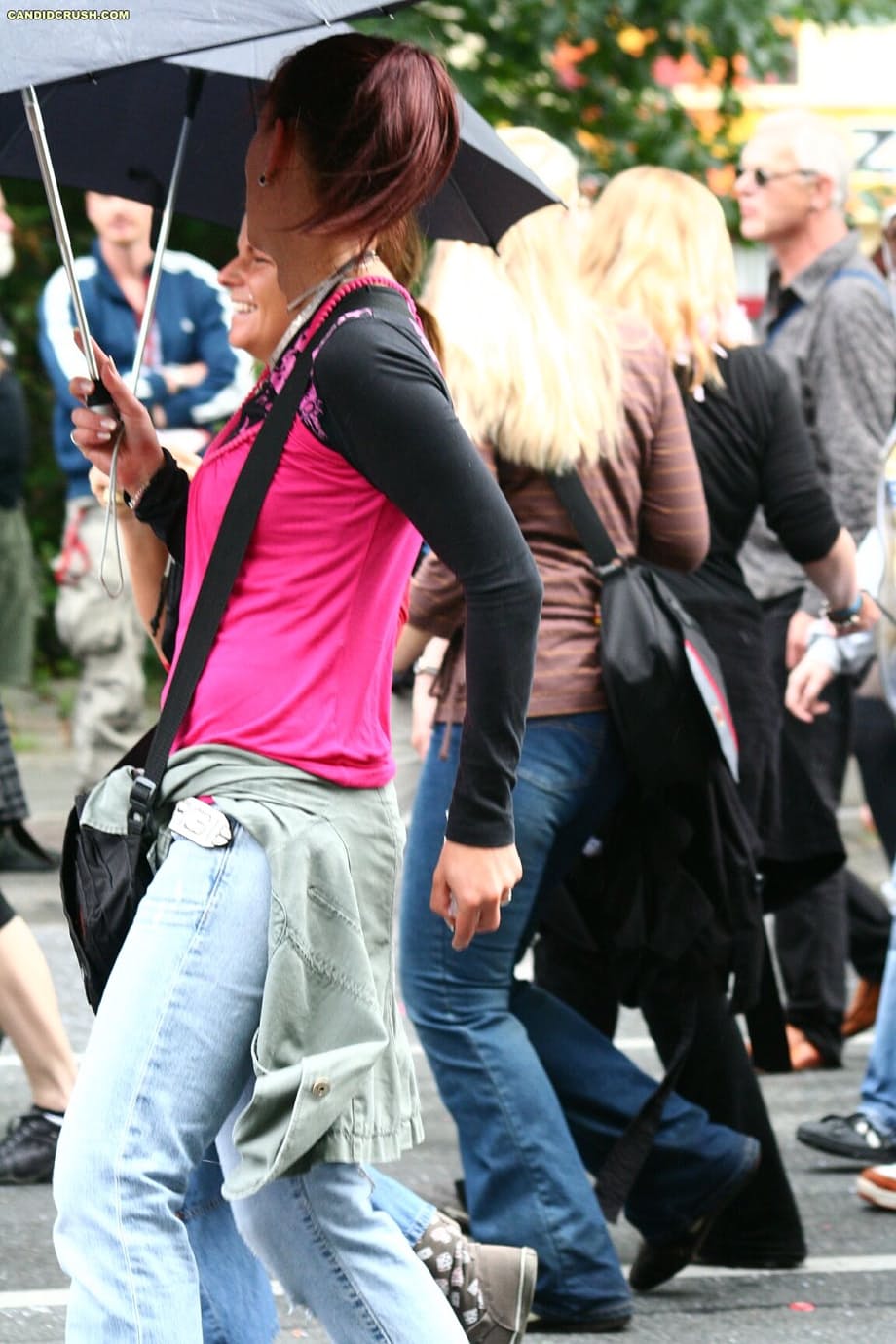 Teen girls at a street party are secretly recorded by a public voyeur