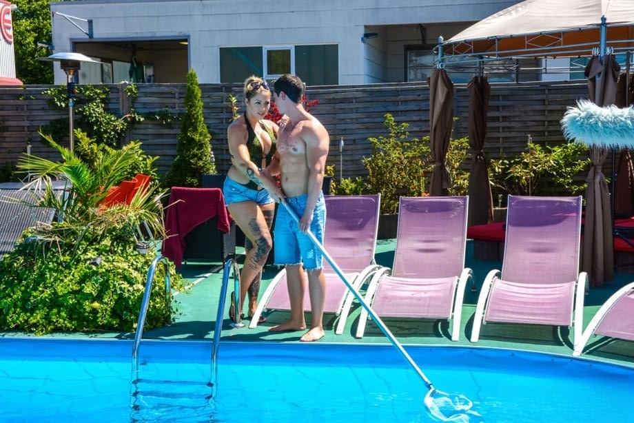 Tattooed chick Mia Blow takes it up the ass after seducing the pool cleaner