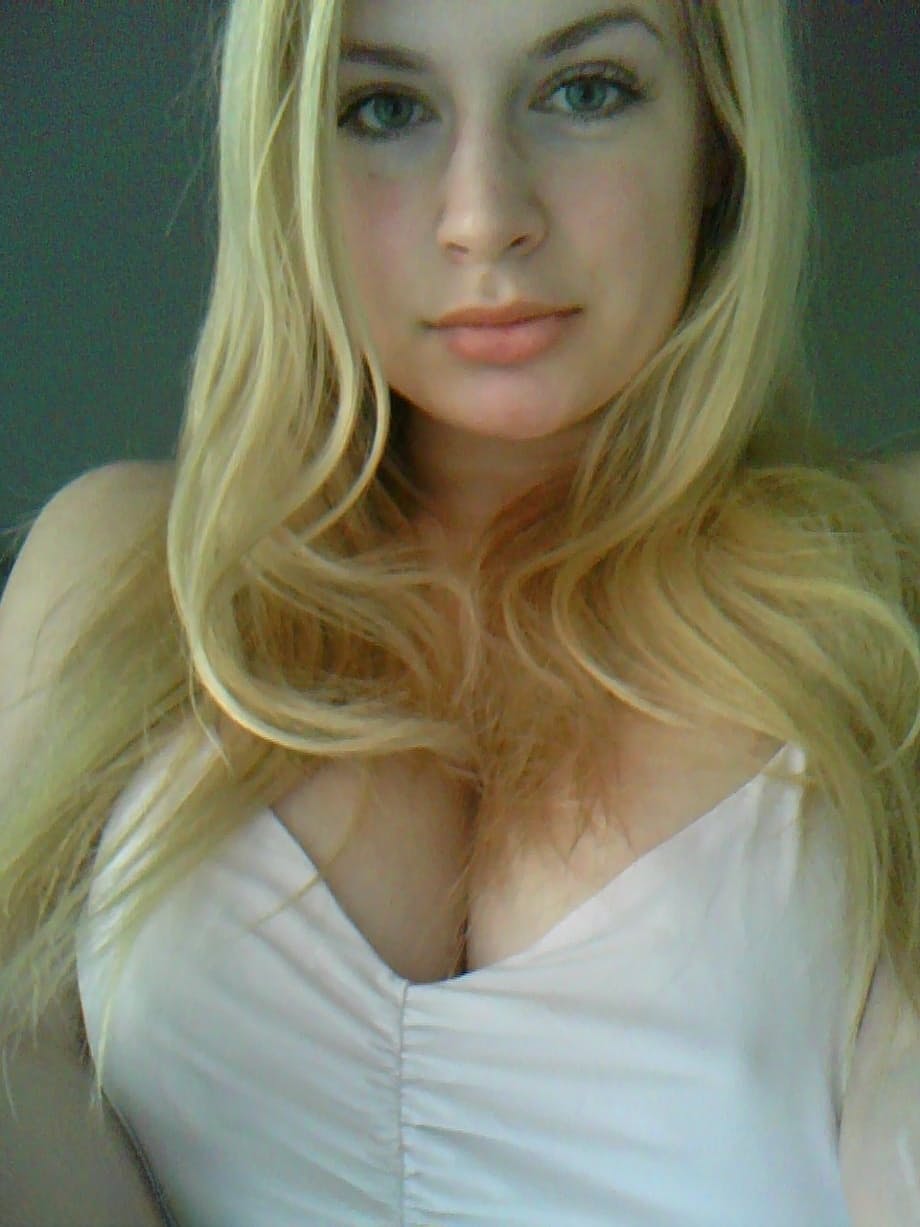 Amateur girl Danielle takes safe for work self shots around her house