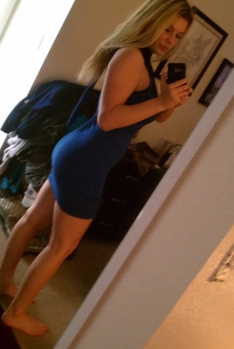 Blonde girl takes non nude selfies in various places around her house