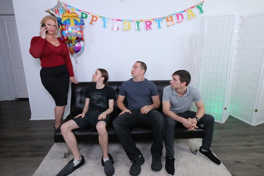 Big boobed blonde lady Selah Rain sucks off three younger boys on her birthday