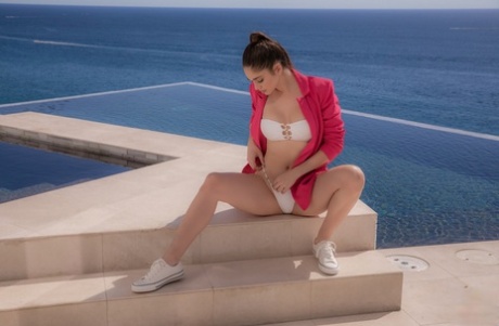 Centerfold model strikes great semi-nude poses on land and at sea
