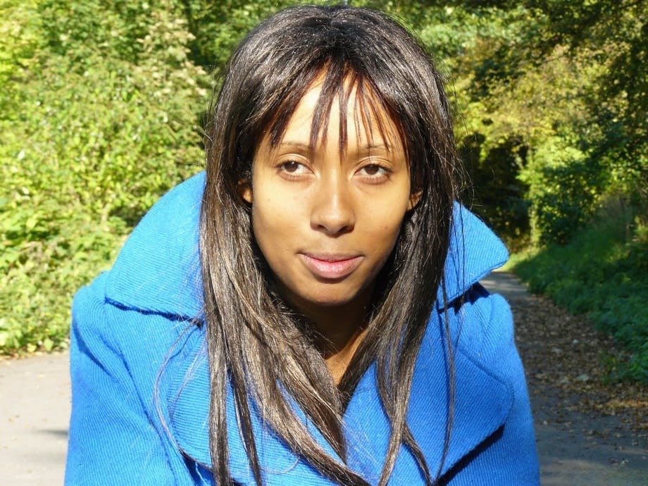 Ebony chick fingers her pussy on roadway while a jogger passes by